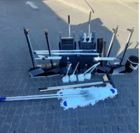 Cleaning tools laid out outdoors
